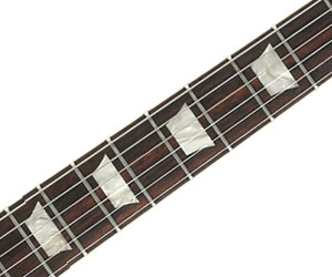 A quoi servent les repères sur le manche de la guitare ?